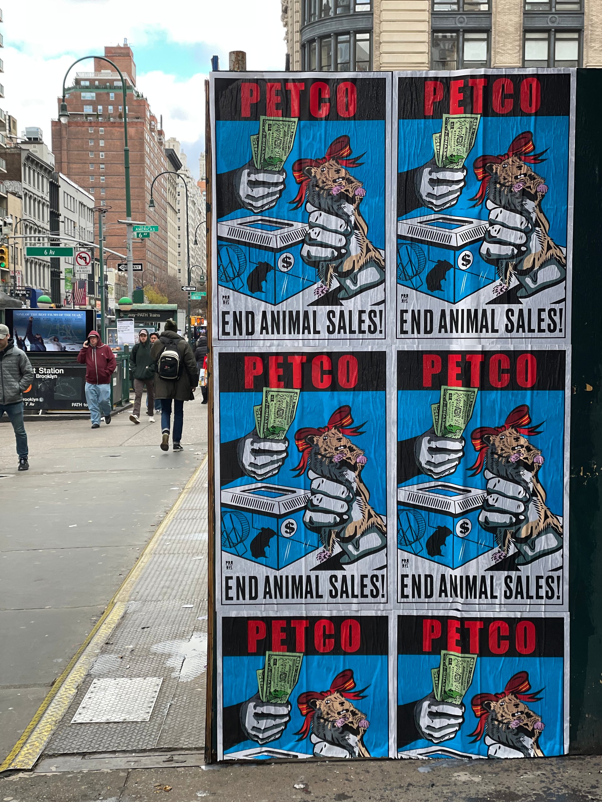 Posters rallying against PetSmart in NYC.