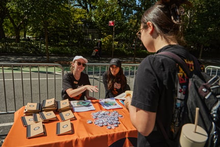 World Animal Protection staff talking to a supporter at an event.